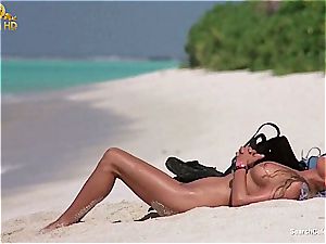 stunning Bo Derek demonstrating off her fur covered pussy at the beach