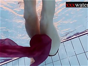 Smoking scorching Russian redhead in the pool